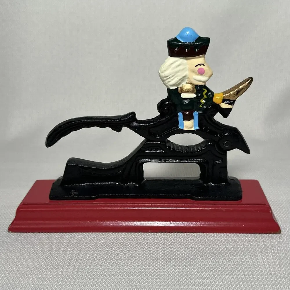 Vintage Cast Iron Soldier Nutcracker Mounted On Red Wooden Base Nut Cracker